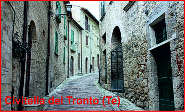 Civitella del Tronto: il borgo più bello d’Italia tra storia e panorami mozzafiato. Civitella del Tronto è uno dei borghi più affascinanti e rinomati della provincia di Teramo, riconosciuto tra i “Borghi più belli d’Italia” grazie al suo straordinario patrimonio storico e paesaggistico. Arroccato su un colle che domina la valle del Tronto, il borgo si caratterizza per le stradine acciottolate, le case in pietra e le piazzette suggestive che conservano l’atmosfera autentica del passato. Il vero simbolo di Civitella del Tronto è la sua imponente fortezza spagnola, tra le più grandi e meglio conservate d’Europa, che racconta secoli di storia militare, resistenza e tradizione, offrendo ai visitatori un percorso unico tra bastioni, torri e vedute panoramiche che abbracciano monti, vallate e il mare Adriatico nelle giornate limpide. Oltre al fascino storico, Civitella del Tronto incanta per la bellezza del borgo medievale, dove botteghe artigiane, chiese e antichi palazzi si affacciano su vicoli suggestivi, regalando un’esperienza autentica e immersiva tra cultura, arte e tradizioni locali. Il borgo è anche punto di partenza ideale per escursioni naturalistiche e percorsi enogastronomici, con prodotti tipici locali come formaggi, salumi e dolci tradizionali che completano l’esperienza di visita. Tra storia, panorami mozzafiato e atmosfere senza tempo, Civitella del Tronto rappresenta una meta imperdibile della provincia di Teramo, capace di far rivivere al visitatore l’essenza più autentica dell’Abruzzo.